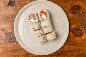 Philadelphia sushi roll on a plate