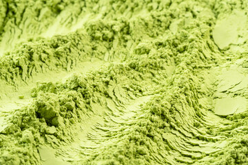 Matcha tea, finely ground powder of green tea  close up.