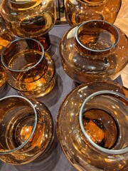 Collection of Amber Glass Vases and Candle Holders