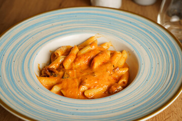 Creamy penne pasta with tomato sauce