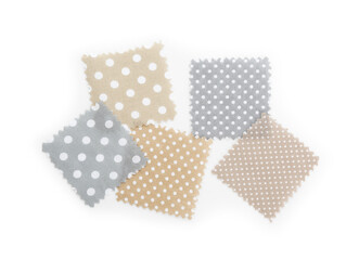 Samples of fabrics with polka dot pattern isolated on white, top view