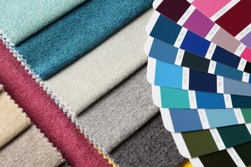 Samples of colorful fabrics and color palettes, above view