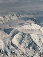 Aerial view of Antarctica white mountains.