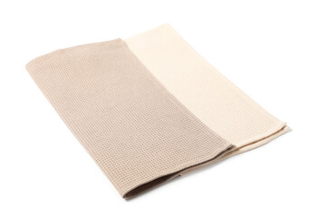 Two clean waffle towels isolated on white