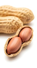 Closeup of two peanuts in shell with blurred background