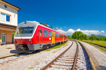 Obraz premium A two-car diesel multiple unit series regional train of the Slovenian Railways