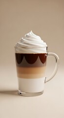Layered coffee drink with whipped cream in glass mug