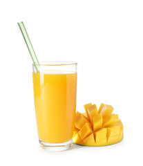 Tasty mango juice in glass and fresh fruit isolated on white