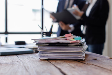 Business Documents,  business people checking and charts to analyze market data, balance sheet,...