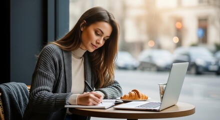 Woman Working in Urban Caf&eacute; at Sunrise