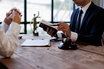 Law theme, gavel and mallet of the judge, Consultation and conference  lawyer enforcement officers, evidence-based cases taken into account in the court about business, legislation.
