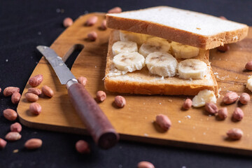 Delicious toast topped with peanut butter, banana slices,Crunchy bread slice with creamy peanut...