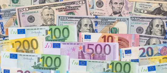mix dollar and euro bills. background. money.