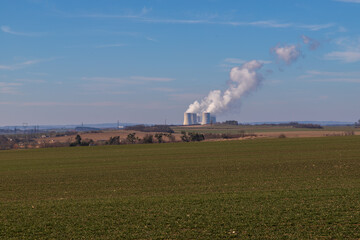Dukovany Nuclear Power Plant in the Czech Republic, Europe. Smoke cooling towers. There are clouds...