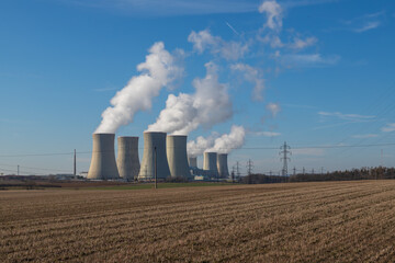 Dukovany Nuclear Power Plant in the Czech Republic, Europe. Smoke cooling towers. There are clouds...