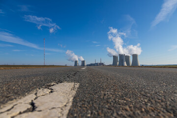 Dukovany Nuclear Power Plant in the Czech Republic, Europe. Smoke cooling towers. There are clouds...