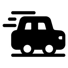 Car is speeding down the road. The car is black and white. The car is moving fast