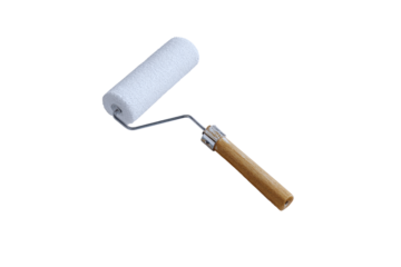 A new paint roller with a fluffy white head and wooden handle ready for use in home improvement projects