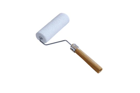 A new paint roller with a fluffy white head and wooden handle ready for use in home improvement projects