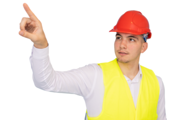 Male engineer in safety helmet, vest pointing at unseen object against crisp white background