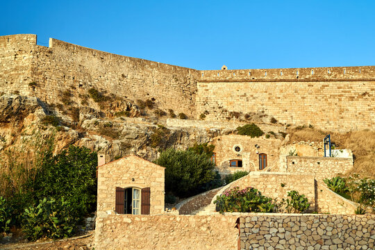 stone, orthodox, chapel and walls of the venetian, medieval fortress in the city of rethymnon on the island of crete