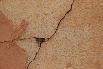 A close-up of a cracked wall