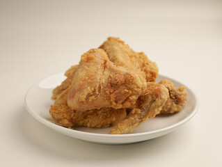 Piled of fried chicken on white background