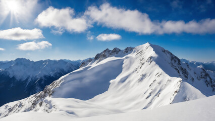 Majestic Snow Capped Mountain Range Under Bright Blue Sky Landscape