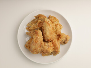 Piled of fried chicken on white background