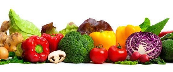 Arrangement of vegetables in appetizing colors in a row, representing a healthy lifestyle and fitness, studio shot isolated on white