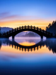 Naklejka premium Japanese Bridge and Reflection at Sunset