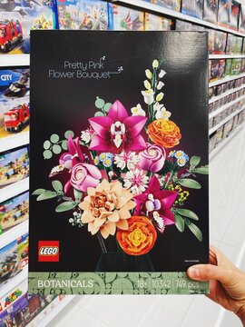 01.06.2025, Alanya, Turkey. LEGO Botanicals set with a colorful bouquet of brick-built flowers. Held in hand in a toy store aisle. Creative hobby, decorative mode and floral theme concept.