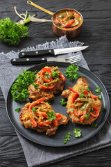 pork chops topped with bell pepper cream gravy