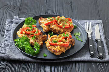 pork chops topped with bell pepper cream gravy