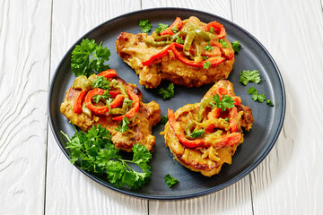 pork chops topped with bell pepper cream gravy