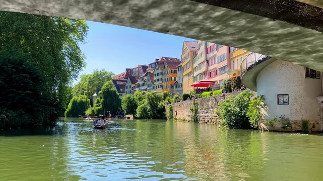 View of the historic old town of T&uuml;bingen from a boat under the Neckar Bridge