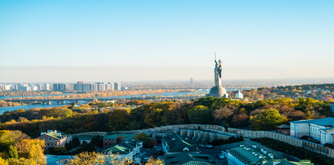 Motherland Monument in Kyiv, Ukraine, with a panoramic view of the city, river