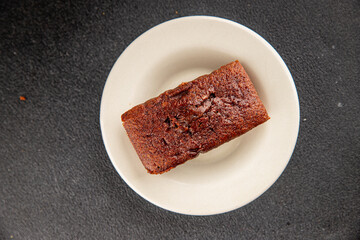 Financier biscuit chocolate cookie sweet dessert fresh delicious gourmet food background on the table rustic food top view copy space