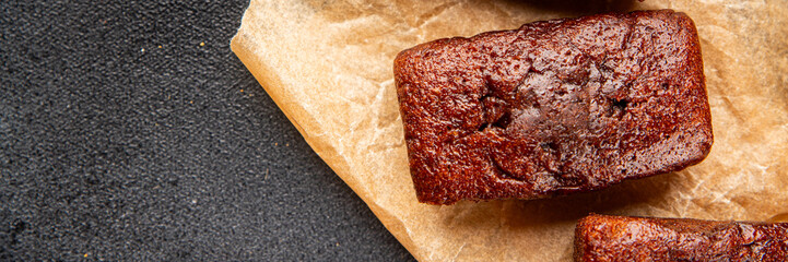 Financier biscuit chocolate cookie sweet dessert fresh delicious gourmet food background on the table rustic food top view copy space