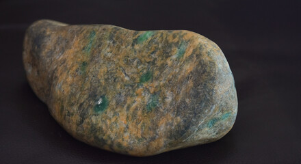 Selected diamonds In the tong On the piano background