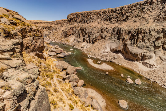Sumbay river near Pillones waterfall in Altiplano of Peru