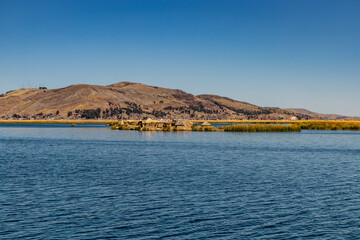 Fototapeta premium Uros floating island on Titicaca lake, Peru