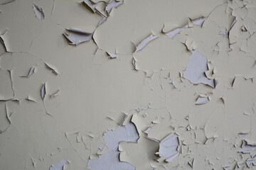 Texture: Old wall, light yellow, with cracked paint.