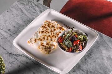 Freshly Baked Lasagna with Creamy White Sauce and Salad Bowl on Plate.jpg, Freshly Baked Lasagna with Creamy White Sauce and Salad Bowl on Plate