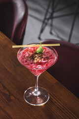 Strawberry-Flavored Pink Dessert in Decorative Glass Dish - Sweet Pink Strawberry Mousse Served Elegantly in Dessert Glass