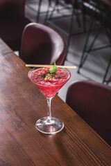 Strawberry-Flavored Pink Dessert in Decorative Glass Dish - Sweet Pink Strawberry Mousse Served Elegantly in Dessert Glass