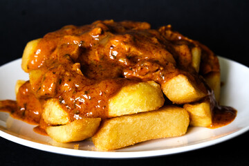 Plate Of British Favourite Chicken Curry And Chips
