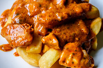 Plate Of British Favourite Chicken Curry And Chips