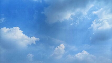 Dynamic Blue Sky with Light Rays Through Clouds