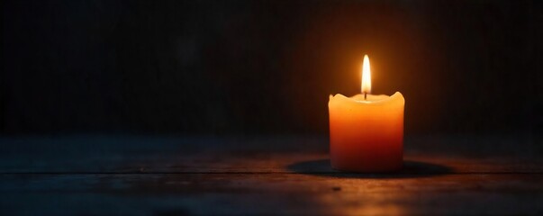 A single candle flame illuminates a darkened room, casting soft shadows and creating a peaceful, meditative atmosphere Perfect for themes of hope, faith, and inner peace , spiritual, illumination
